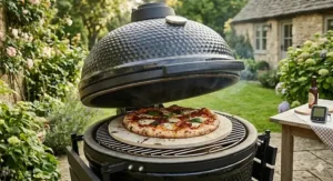 Wisps of blue smoke escaping a kamado grill lid during a low and slow smoking session, ideal for preparing tender pulled pork or beef.