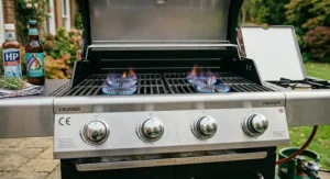 Illustration of the elevated chrome warming rack inside a 4 burner gas barbecue, holding toasted burger buns.