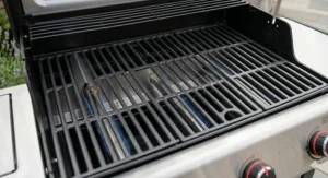 Heavy-duty porcelain-enamelled cast iron cooking grates on a 3 burner gas BBQ for authentic sear marks.