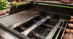 Close-up of three high-grade stainless steel burners providing even heat distribution for outdoor cooking.