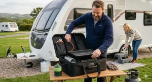 A small gas barbecue packed neatly inside its durable, compact carry case.