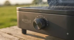 Close-up of the adjustable temperature control dial on an outdoor electric BBQ.