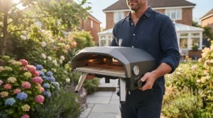Detailed view of the control dial and built-in thermometer on an affordable pizza oven.