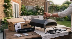Step-by-step assembly of a portable charcoal pizza oven on a wooden garden table.