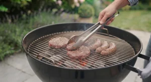 Family-friendly barbecue food grilling over hot instant charcoal on a British summer afternoon.