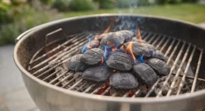 Close-up of instant light charcoal catching fire quickly for a fast BBQ startup.