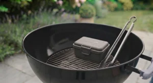 Storing unused instant light charcoal briquettes in a dry garden storage container.